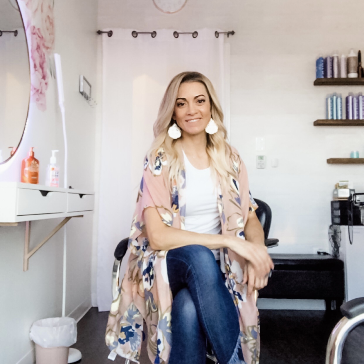 Denice Croft seated in her salon suite